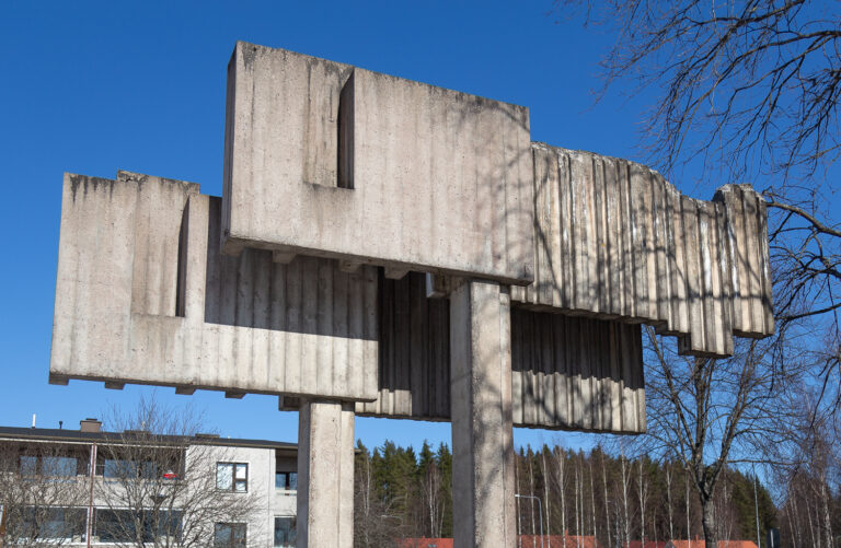 A close-up of a massive concrete monument.